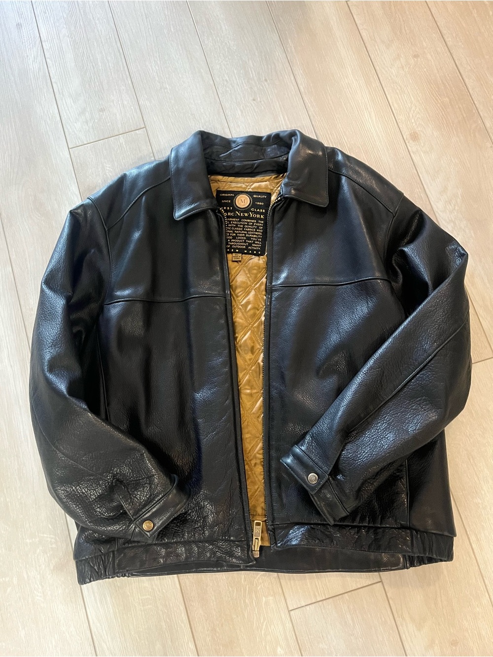 Andrew Marc Black Leather Bomber Jacket with Gold Quilted Lining